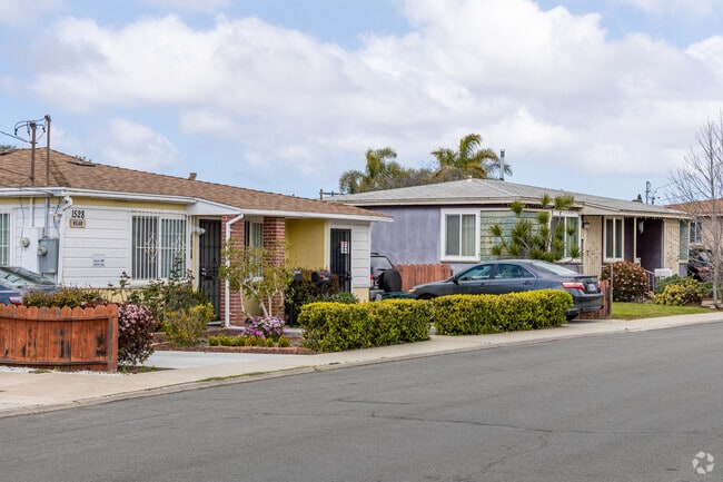 Bungalow homes in Linda Vista often feature pastel-colored exteriors.