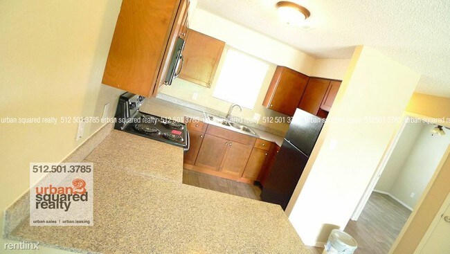Foto del edificio - 4716 Bull Creek Rd