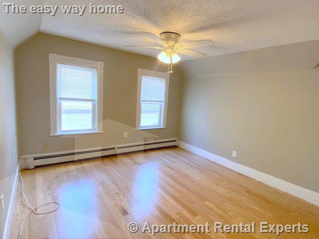 Building Photo - Brand New Hardwoods * Fresh Paint * Pristi...
