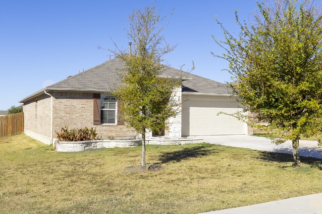 Building Photo - Kyle Home has Large Deck for Entertaining!