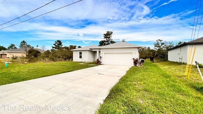 Foto del edificio - 4 br, 2 bath House - 9 Orchid Ln