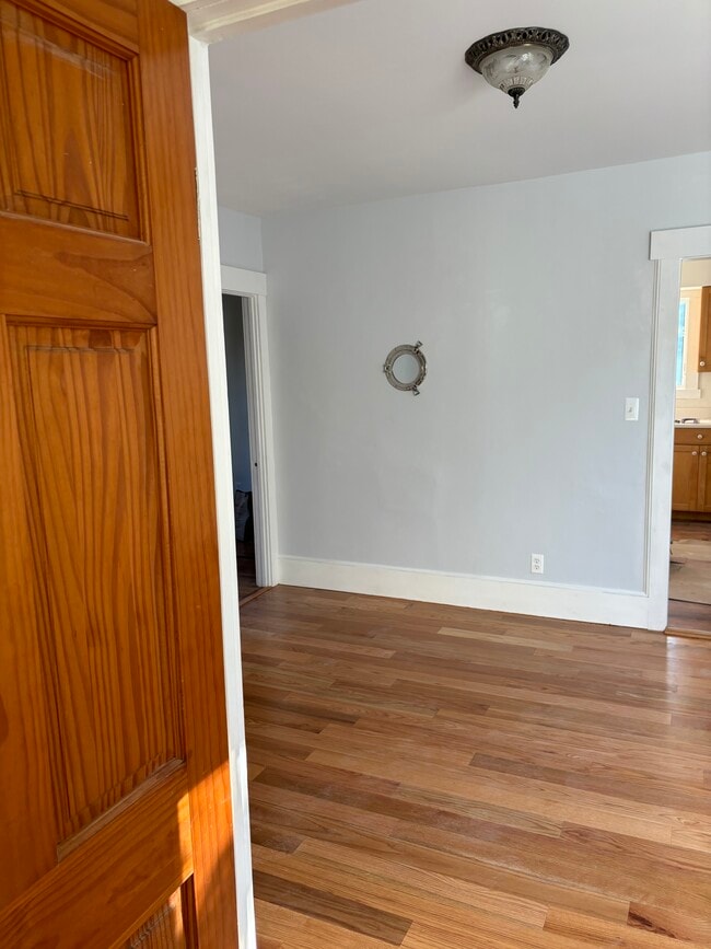 Living rooms with new hardwood flooring - 47 Trumbull Ave