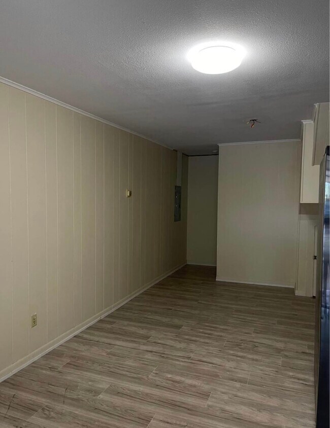 Extra living or entertainment area in downstairs entrance. - 626 Electra St
