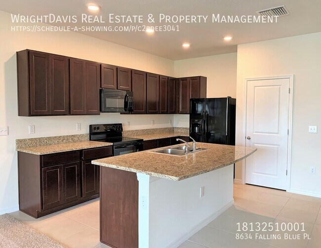 Foto del edificio - 8634 Falling Blue Pl