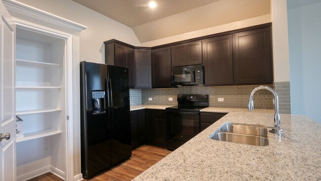 Building Photo - Spacious Single-Family Home Available Now!