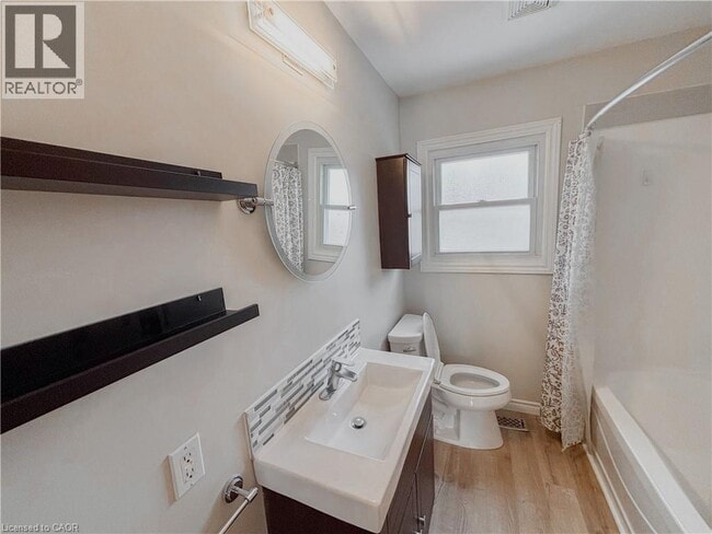 Building Photo - 122 Weber St S