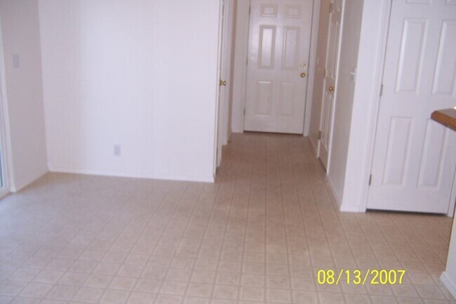 Building Photo - Sparkling clean with all new paint and flooring!l Great duplex has a well planned floor plan. Goo...