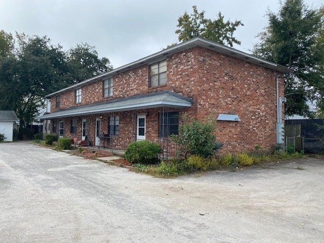 Building Photo - 4011 West Montague Avenue - 9 Unit 9