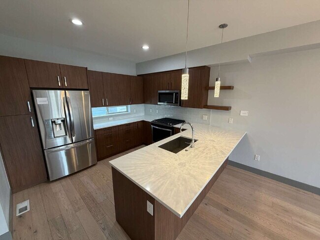 Building Photo - Modern 2-Bed Townhouse with Scenic Views in Denver's Heart-built in EV charger!