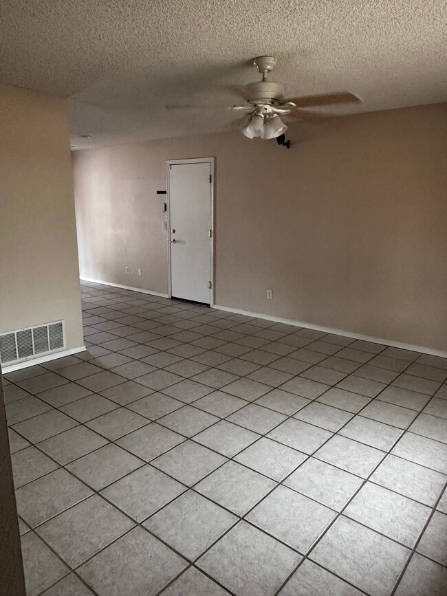 Living room looking in from front door - 4791 W Red Wolf Dr