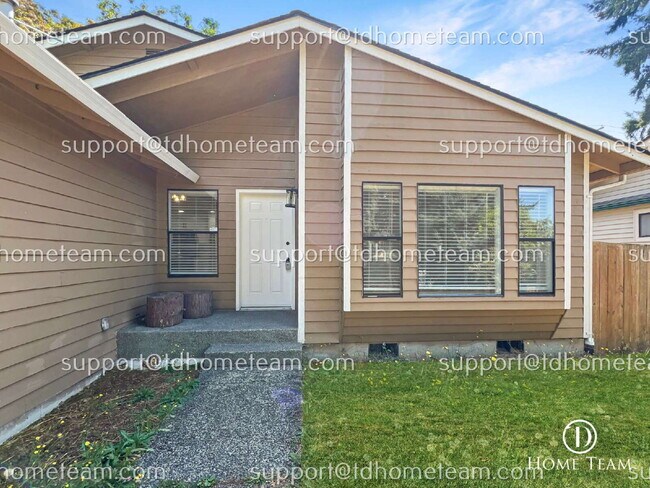 Building Photo - "Charming 3-Bedroom Retreat with Cozy Fire...