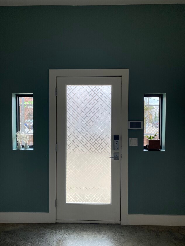 Front door from downstairs bedroom view - 1432 S Trenton Ave