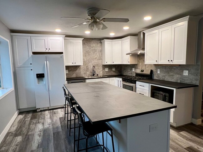 Foto del edificio - 7329 E Lewis Ave