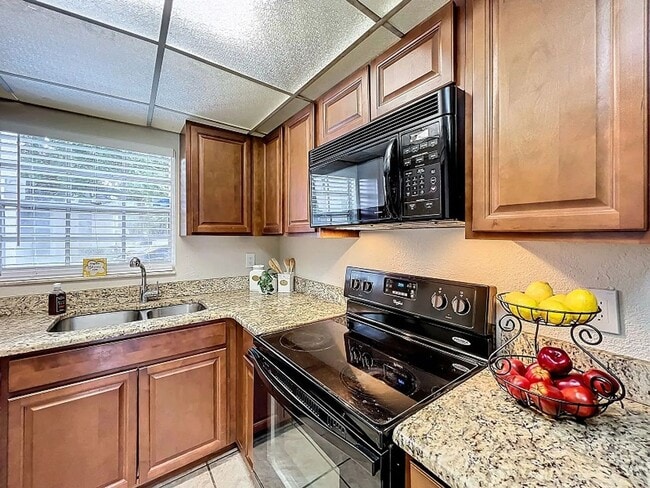 Building Photo - Charming 2BR Condo in Brandon