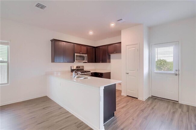 Building Photo - 7508 Tonka Ln