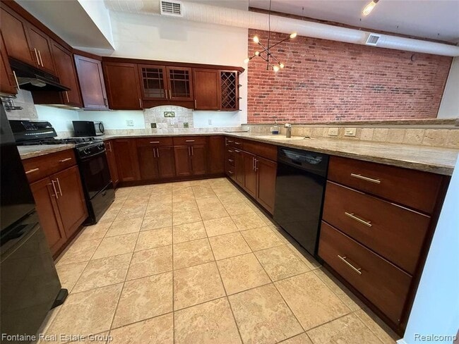 Foto del edificio - 107 W Grand River Ave