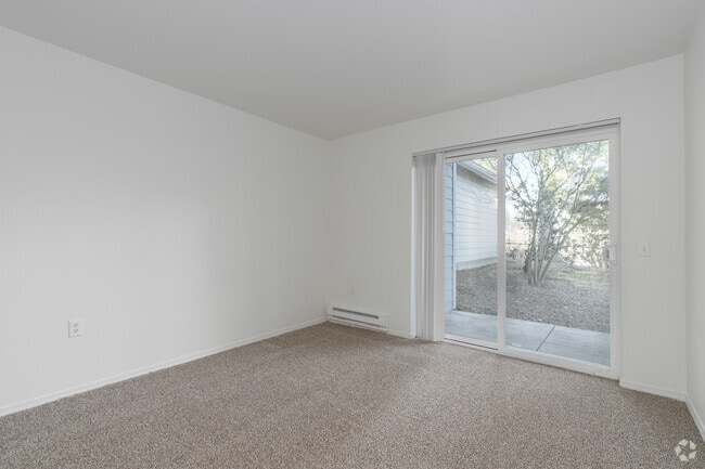 3BR, 2BA - 1,185SF - Primary Bedroom - Quatama Village Apartments