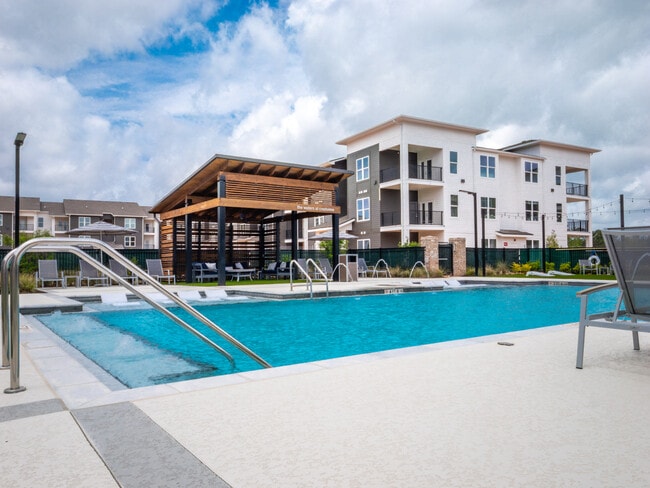 Resort-Style Pool with Baja Tanning Shelf - The Waters at Crestview
