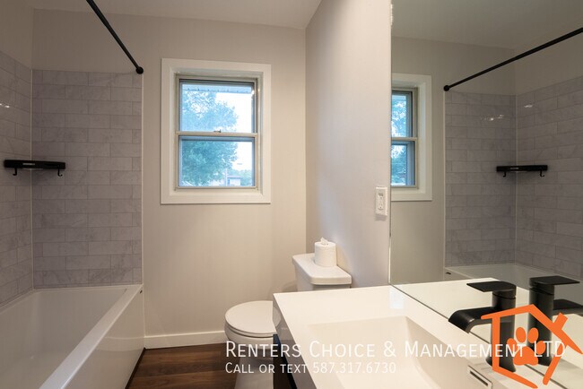 Photo du bâtiment - 2 Bedroom Pet Friendly House, BONUS INCENT...