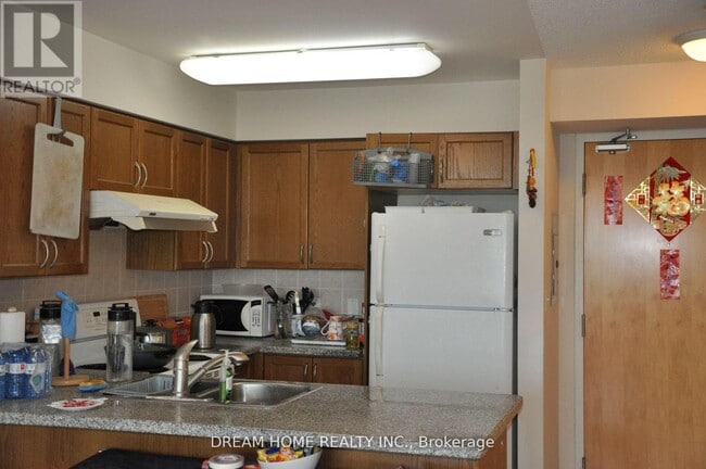 Photo du bâtiment - 7363-7363 Kennedy Rd