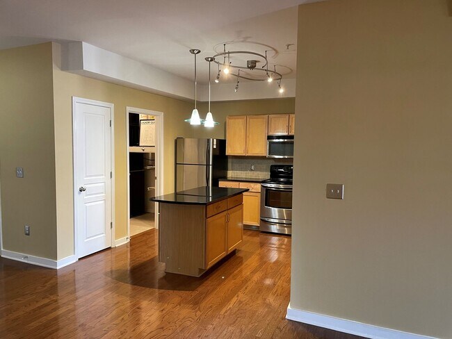 Building Photo - Sleek City Living: Oversized 2BR with Open...