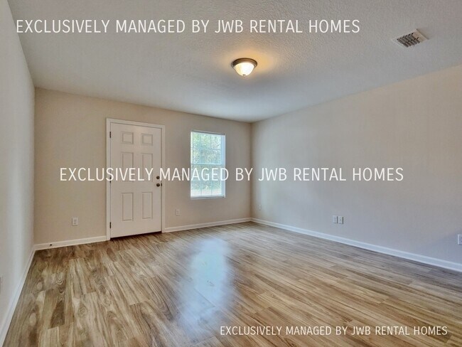 Building Photo - 8487 McGirts Village Ln