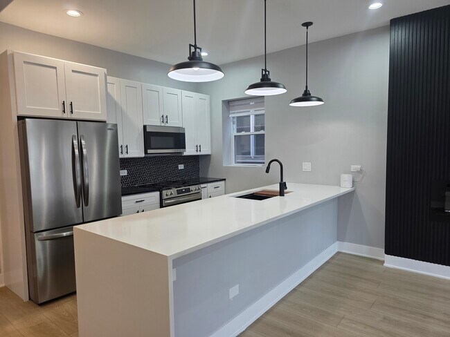 Foto del edificio - 6649 S Woodlawn Ave