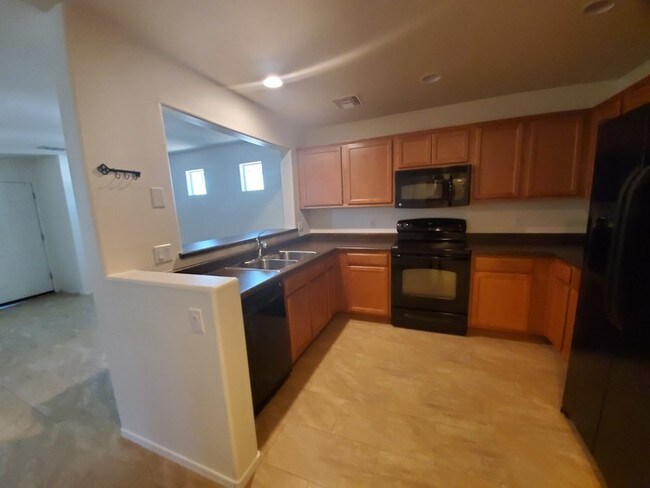 Building Photo - 10675 E Singing Canyon Dr