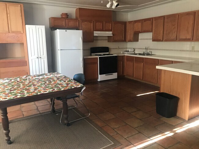 Open kitchen with dining table - 121 S. Rio Vista Road