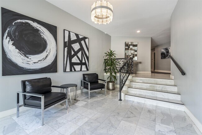 Chic modern foyer - 8490 Fountain Ave