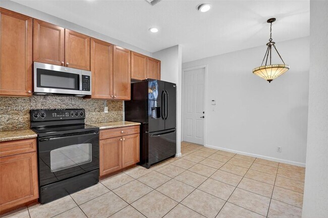 Foto del edificio - 16097 Poppy Seed Cir