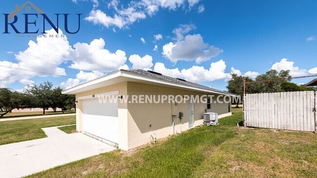 Building Photo - Spring into savings with 50% off your firs...