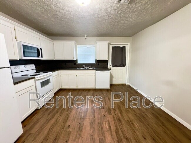 Foto del edificio - 302 W 8th St