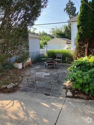 rear sandstone patio - 17003 Hilliard Rd