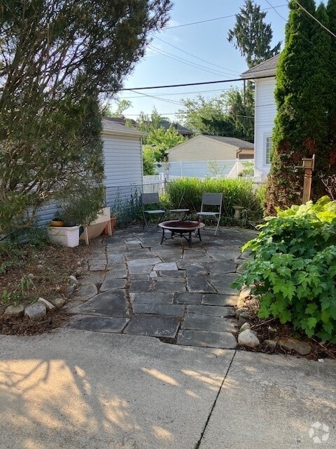 rear sandstone patio - 17003 Hilliard Rd