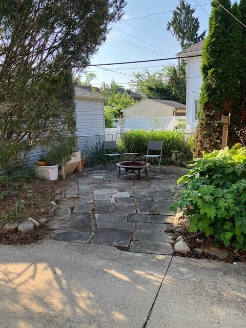 rear sandstone patio - 17003 Hilliard Rd