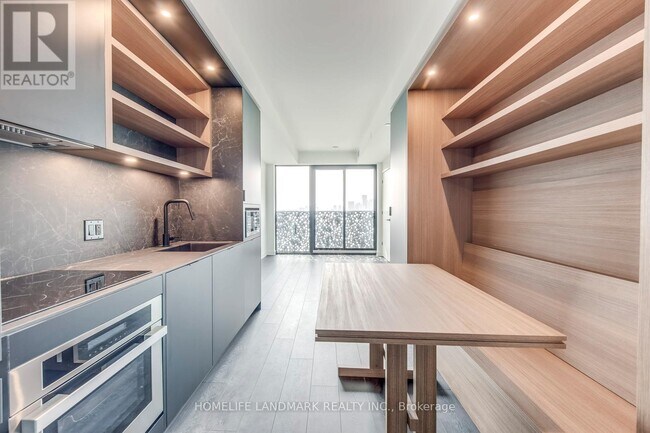 Photo du bâtiment - 55 Charles St E