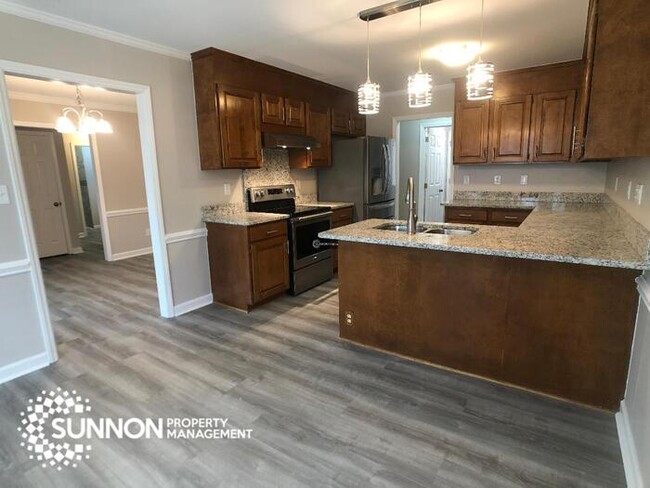 Building Photo - Completely Renovated 3 BR with Huge Yard
