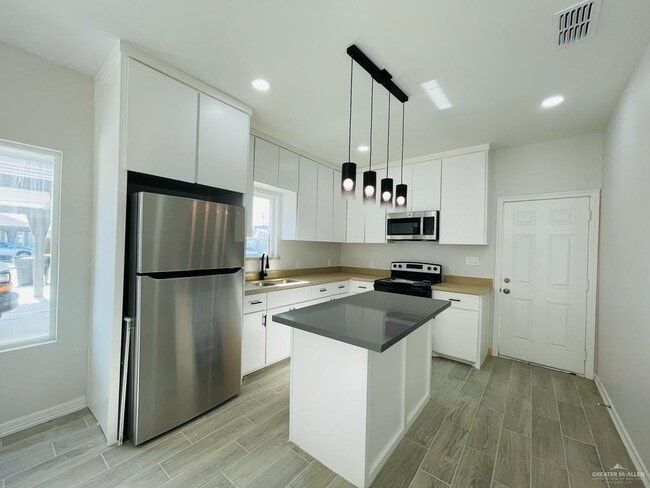 Building Photo - 1217 S Xanthia St