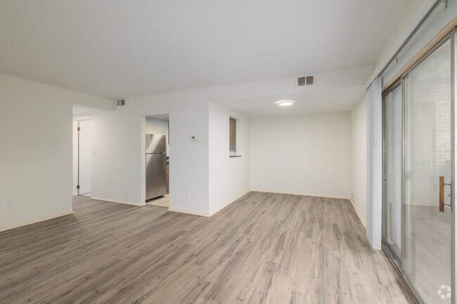 2BR , 1BA - 1,073SF - Living Room - Village Square