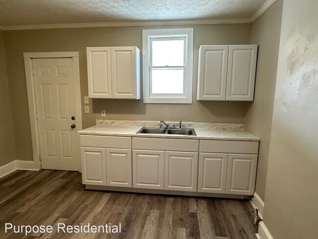 Building Photo - 3 br, 1 bath House - 1017 E. 16th Avenue