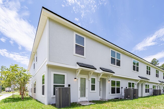 Foto del edificio - Waterside Townhomes at River City