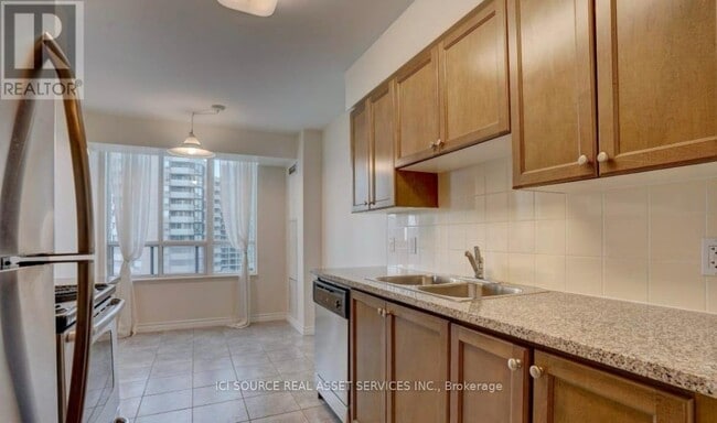 Building Photo - 335 Rathburn Rd W