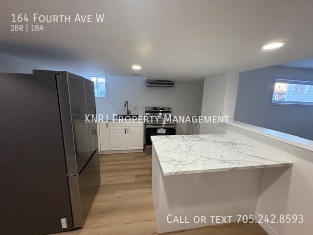 Building Photo - Two Bedroom Basement Apartment with Yard