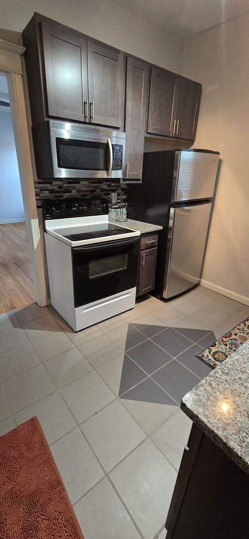 Foto del edificio - Charming Condo Walkable to Central West End-Washer Dryer in Unit