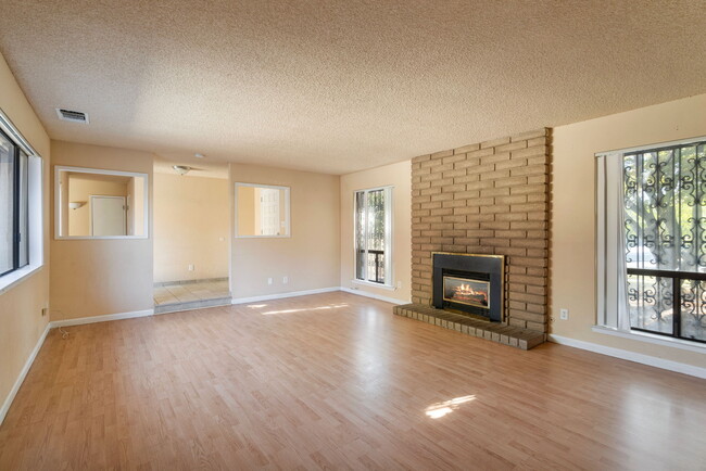 living room facing fireplace - 5079 E BREMER AVE