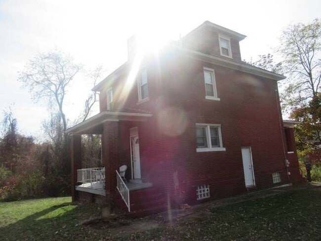 Building Photo - Traditional brick home high up on Aliquipp...