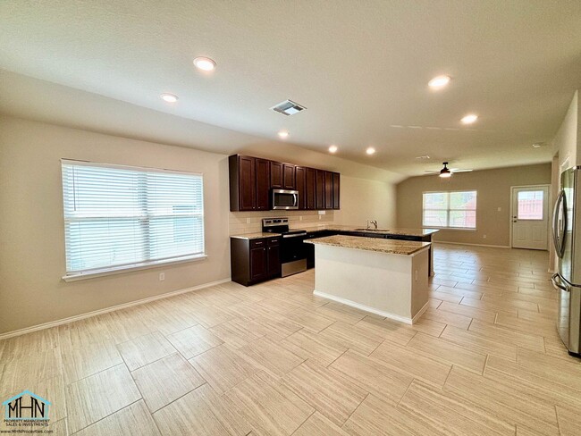 Building Photo - A Stunning Modern Home with Open Floor Pla...