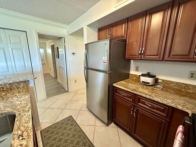 Building Photo - Furnished 2BR with Stunning Views in Feather Sound – Move-In Ready!