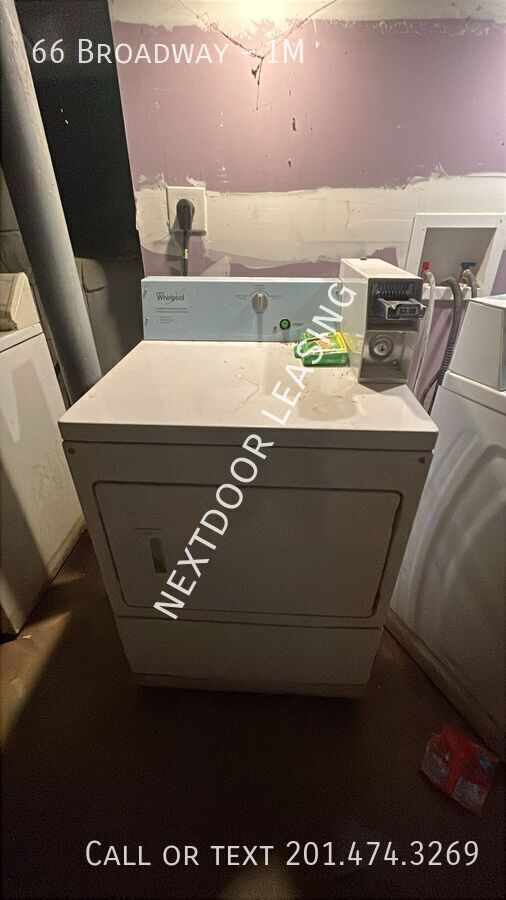 Foto del edificio - 66 Broadway-1M